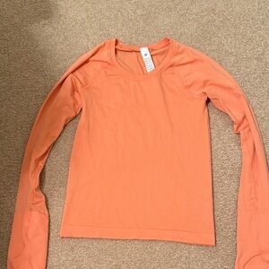 Women's Lululemon Swiftly Tech Orange Long Sleeve race length Top size 2